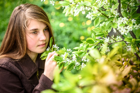Outdoors portrait of beautiful young girlの写真素材