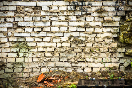 Fragment of an old brick wall. Ruin.の写真素材