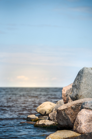 Seascape vertical. Large Stones and Seaの写真素材