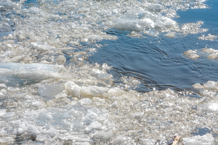 Ice drift on the water in early spring. Backgroundの写真素材