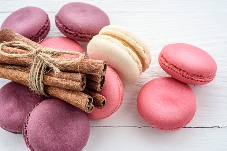 Sweet macarons on a white  background. Trendy cakes.の写真素材