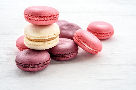 Sweet macarons on a white  background. Trendy cakes.の写真素材