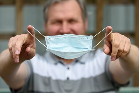 Human, quarantine period and medical mask-coronavirus pandemicの写真素材