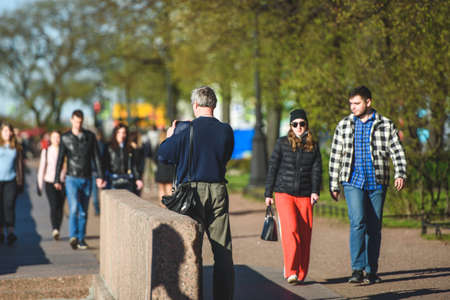 Russia, Saint Petersburg, may 23, 2020:people on a walk on the embankment after the quarantineのeditorial素材