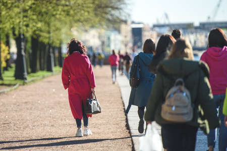 Russia, Saint Petersburg, may 23, 2020:people on a walk on the embankment after the quarantine