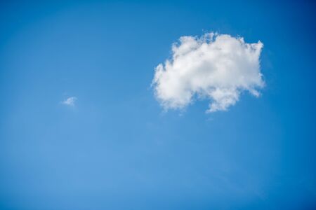 fluffy white cloud on a blue sky