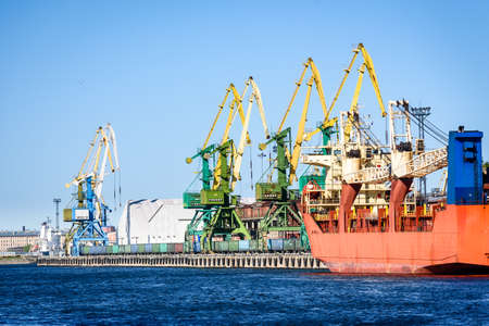 Russia, Saint Petersburg, may 30, 2020: View of the seaport. Cranes and ships.のeditorial素材