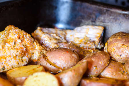 Baked meat with potatoes.Home kitchenのeditorial素材