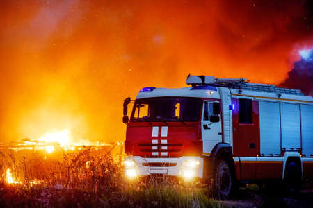 The fire truck on the night fireのeditorial素材