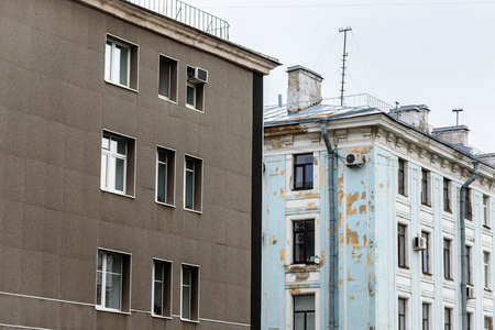 Russia, Saint Petersburg, July 31, 2020: an old building next to a new modern one in the cityのeditorial素材