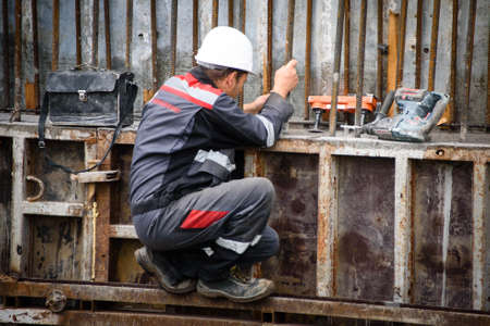 Russia Petersburg August 4, 2020: Workers perform bridge repairs in the city.