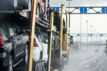 Russia, St. Petersburg, August 26, 2020: traffic on the bypass road during the rain. Bad weather and driving.のeditorial素材