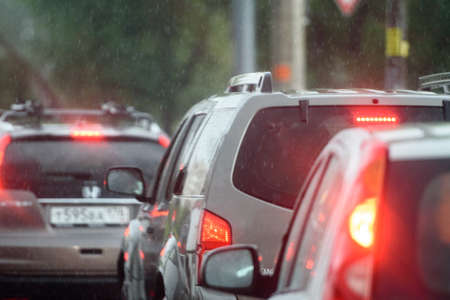 Russia, St. Petersburg, August 26, 2020: traffic on the bypass road during the rain. Bad weather and driving.のeditorial素材