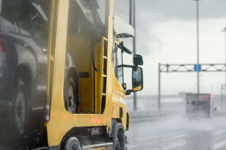 Russia, St. Petersburg, August 26, 2020: traffic on the bypass road during the rain. Bad weather and driving.のeditorial素材