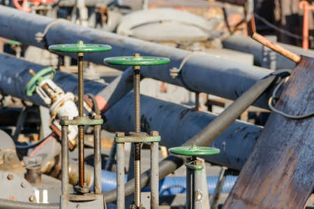 Russia, Saint Petersburg, May 2021: Cranes and pipes on board an oil tankerのeditorial素材