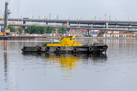 Russia, Saint Petersburg, May 2021: Sea Cargo Port, cranes and shipsのeditorial素材