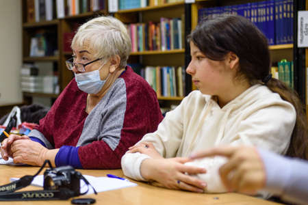 Russia St. Petersburg November 2021: Students in the class listens to photo coursesのeditorial素材