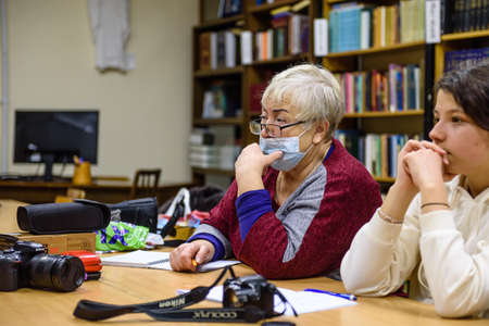 Russia St. Petersburg November 2021: Students in the class listens to photo coursesのeditorial素材