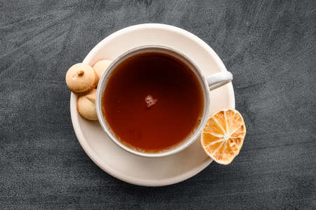 A cup of tea on a black background top viewの写真素材