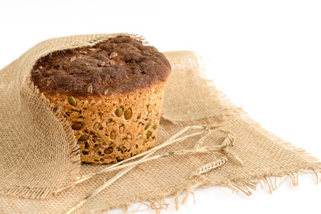 Fresh homemade grain bread on whiteの写真素材