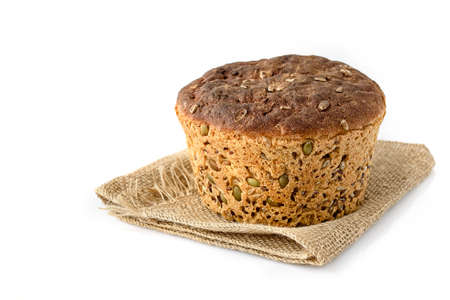 Fresh homemade grain bread on whiteの写真素材