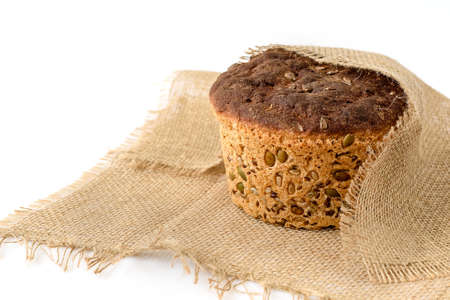 Fresh homemade grain bread on whiteの写真素材