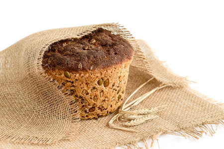 Fresh homemade grain bread on whiteの写真素材