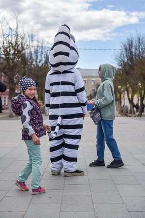 Russia, Gatchina, May 14, 2022: Animators in costume on the city street - work in advertisingのeditorial素材