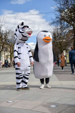 Russia, Gatchina, May 14, 2022: Animators in costume on the city street - work in advertisingのeditorial素材