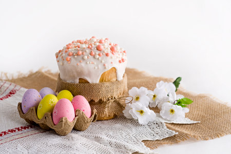 Easter egg and pie on a light table background. Happy Easter background for spring holidays.の写真素材