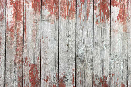 Old wooden background with peeling cracked brown paintの写真素材