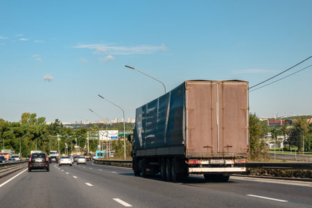 Russia, St. Petersburg, October 2023: the movement of trucks on the highway outside the cityのeditorial素材
