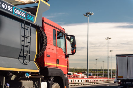 Russia, St. Petersburg, October 2023: the movement of trucks on the highway outside the cityのeditorial素材