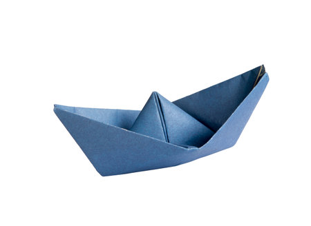 Blue paper boat on transparent backgroundon a white isolated backgroundの写真素材