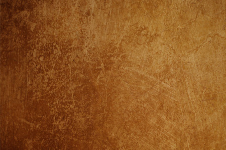 Yellow-brown textured background with scratchesの写真素材