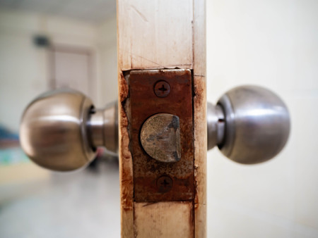 Rusted steel on doorの写真素材