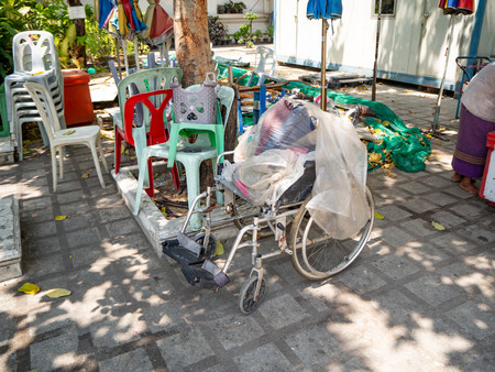 Wheel chair and Plastic bag cover,Bangkok,Thailandの写真素材