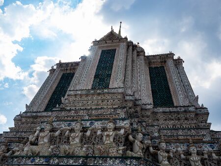 Beautiful old architecture designed by Thai people,Temple name is Wat Arun Ratchawararam Woramahaviharn at Bangkok Thailandの写真素材