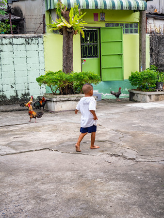 The child is going home at temple name is Wat kaew at Bangkok Thailandのeditorial素材