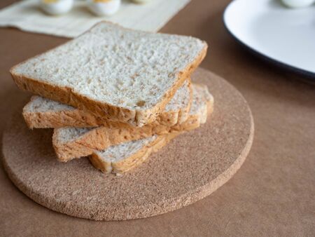 à¸ºBoiled egg topped with Cayenne pepper Pepper and Salt on a white dish,Egg colors white and...