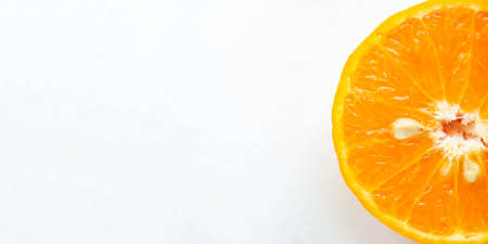 Orange displays details of orange slices and orange seeds on a separate white background.の写真素材