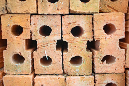 Orange bricks are used for building materials. Put together in layersの写真素材