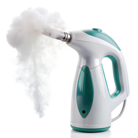 Green electric kettle with smoke on a white background. Isolated.の素材