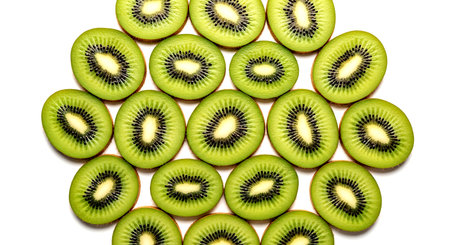 Kiwi fruit slices isolated on white background. Top view.の素材
