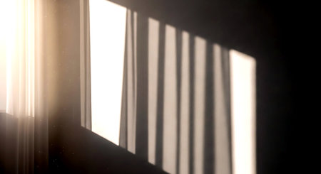 Sunlight through the blinds on a window. Selective focus.の素材