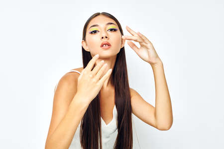 beautiful brunette attractive look fashion posing studio model unalteredの写真素材