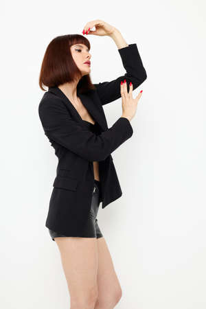 photo pretty woman in leather skirts posing glamor sexy Lifestyle unalteredの写真素材