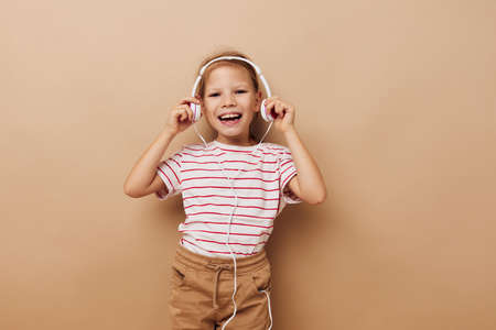 cute little girl headphones childhood music funの写真素材