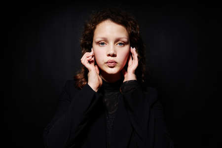 woman in black blazer fashion posing cropped view