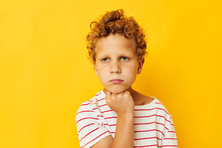 cute boy in striped t-shirt isolated background